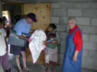 Francis Seivert & Sr. Juanita distribute blankets to Xicaque