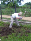 member of BC team working on annex trench