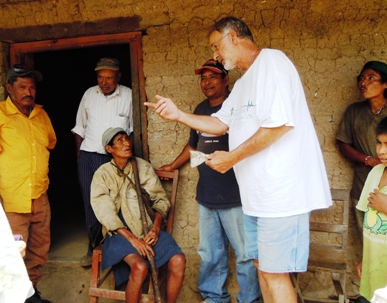 Richard Seivert exchanges peace gifts with Chief Julio