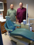David Castro & Dr. Tom Jeneary with dental chair