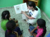 Lise Freking reading to children in library